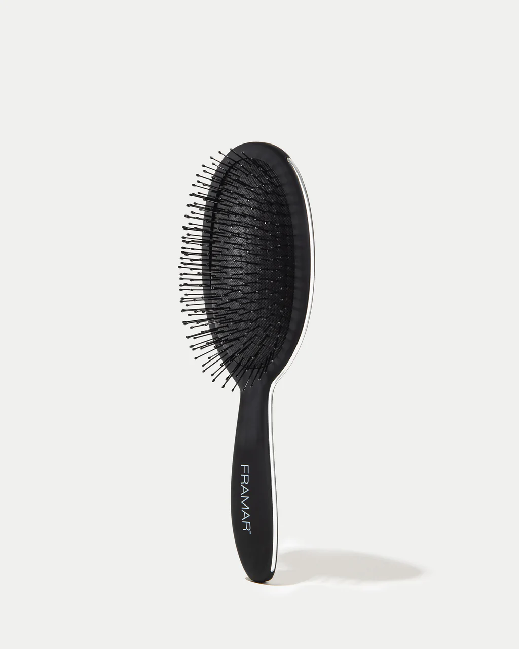 FB-DT-BLK-3_24e5da0e-53a3-4a57-9cb3-bdeeb2614d2b_1024x.webp FRAMAR DETANGLING HAIR BRUSH BLACK TO THE FUTURE - Image 1